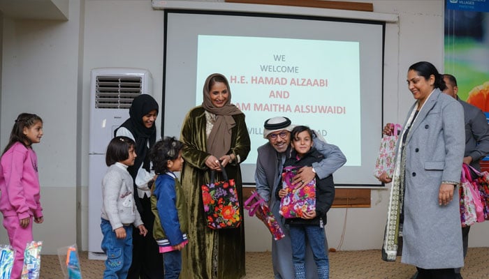 UAE Ambassador Hamad Obaid Alzaabi (centre) and his wife Maitha Majid Al Suwaidi at the SOS Children’s Village in Islamabad on December 13, 2024. — Facebook@soscvislamabad