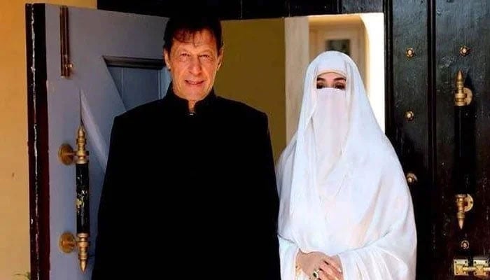 PTI founder Imran Khan with his wife Bushra Bibi. — X@PTIofficial/File