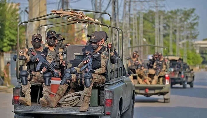 Pakistan Army soldiers depart in their vehicles in Rawalpindi on September 13, 2021. — AFP