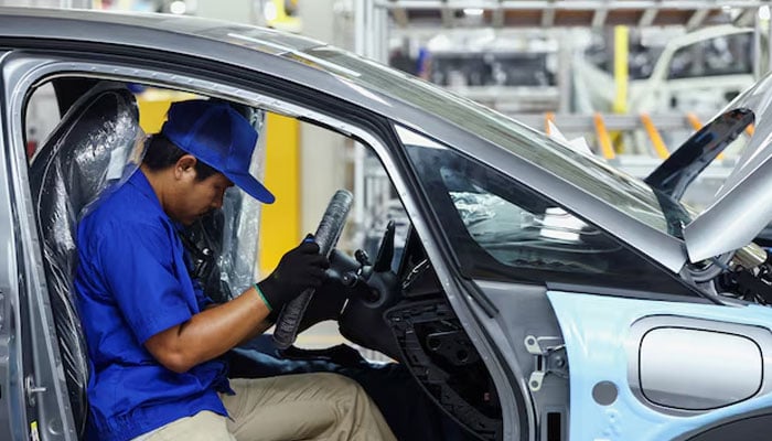 A worker assembles an EV car inside BYDs first electric vehicle (EV) factory in Southeast Asia, a fast-growing regional EV market where it has become the dominant player, in Rayong, Thailand, July 4, 2024. — Reuters