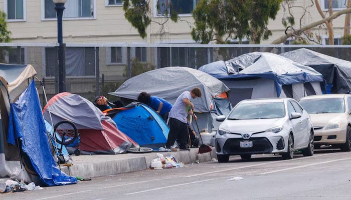 A sidewalk filled with tents is shown in San Diego, California, US, July, 31,2023. — Reuters