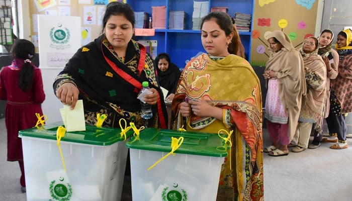 Women casts their vote at a polling station during the countrys parliamentary elections, in Islamabad on February 8, 2024. — Online