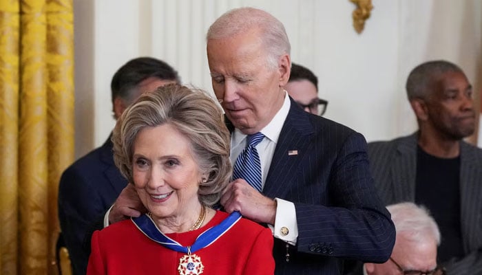 US President Joe Biden presents the Presidential Medal of Freedom to Former US Secretary of State Hillary Clinton, during a ceremony in the East Room of the White House, in Washington, US January 4, 2025. — Reuters