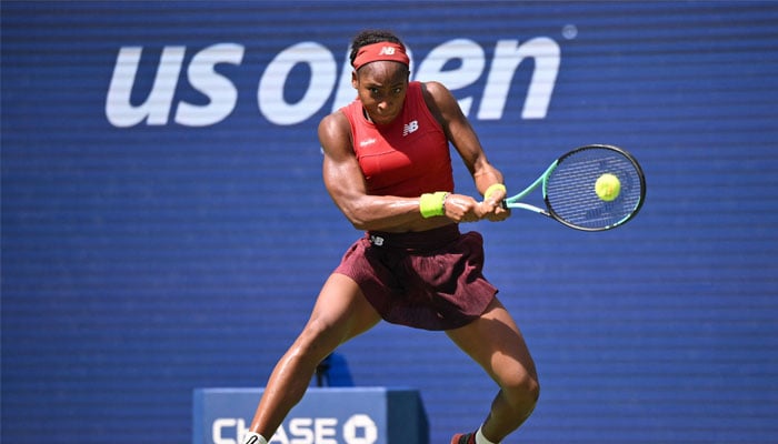 USAs Coco Gauff hits a return to Latvias Jelena Ostapenko during the US Open tennis tournament womens singles quarter-finals match at the USTA Billie Jean King National Tennis Center in NYC, on September 5, 2023. — AFP