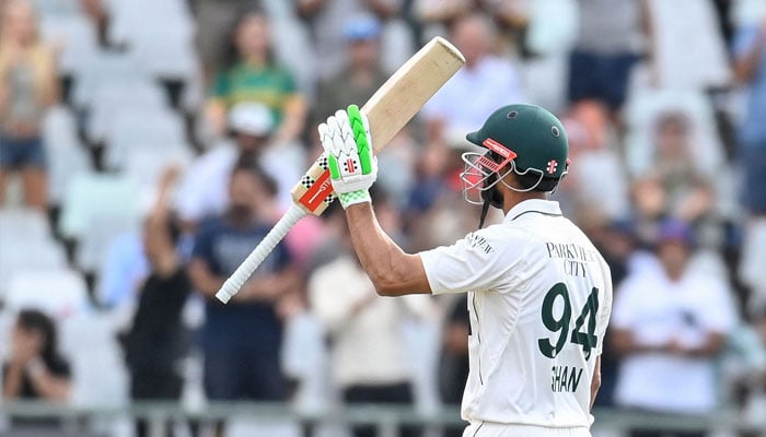 Pakistan´s Shan Masood celebrates after scoring a century (100 runs) during the third day of the second international Test cricket match between South Africa and Pakistan at Newlands stadium in Cape Town on January 5, 2025. — AFP