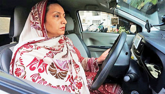 A Pakistani woman driving a car. — Reuters/File