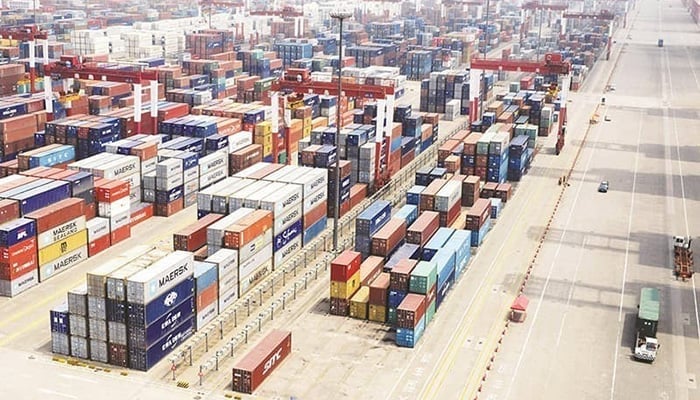 Containers can be seen at a port in this image. — AFP/File