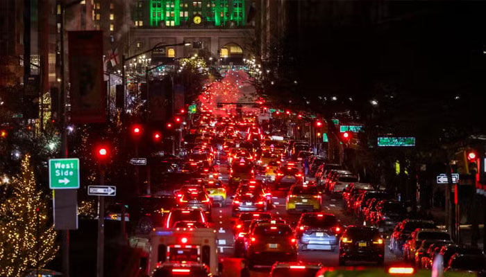 Cars move along Park Avenue in the Manhattan, New York City on December 18, 2024. — AFP/File