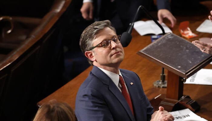 Mike Johnson, seen receiving applause after being re-elected speaker of the US House of Representatives, . —AFP/File