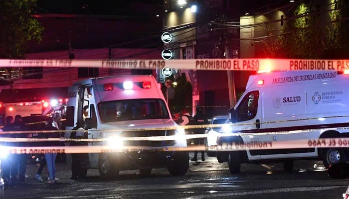 Authorities work at a crime scene where gunmen entered a bar killing and injuring several people, in Santiago de Queretaro, Queretaro state, Mexico on November 9, 2024. — Reuters