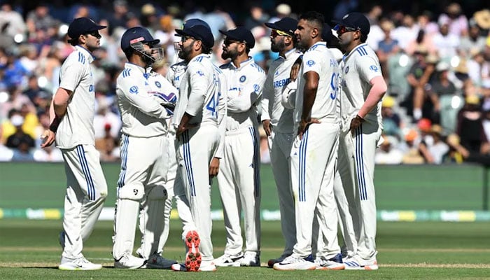 Players of the Indian team are seen standing together on field. — AFP/File