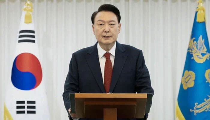 This handout photo taken on December 14, 2024 and released by the South Korean Presidential Office shows then President Yoon Suk Yeol giving a public address from his official residence in Seoul. — AFP