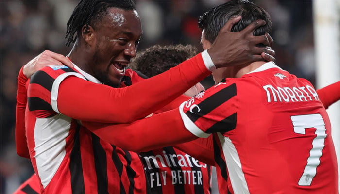 AC Milans English forward Tammy Abraham (left) celebrates with Spanish forward Alvaro Morata after scoring the winner in the Italian Super Cup final against Inter Milan in Riyadh. —AFP/File