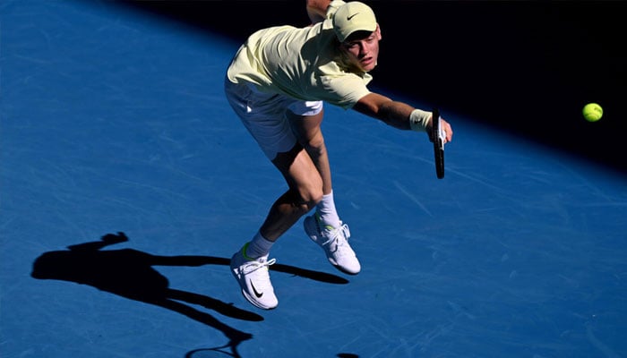 Jannik Sinner of Italy hits a return in Melbourne on Tuesday. — AFP/File