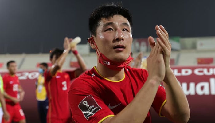 Chinas Wu Lei applauds fans after the match. — Reuters/File