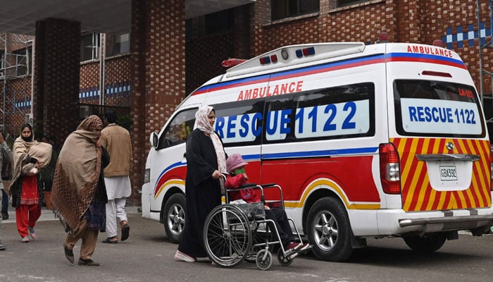 Rescue 1122 ambulance is parked outside a hospital on January 31, 2024. — AFP