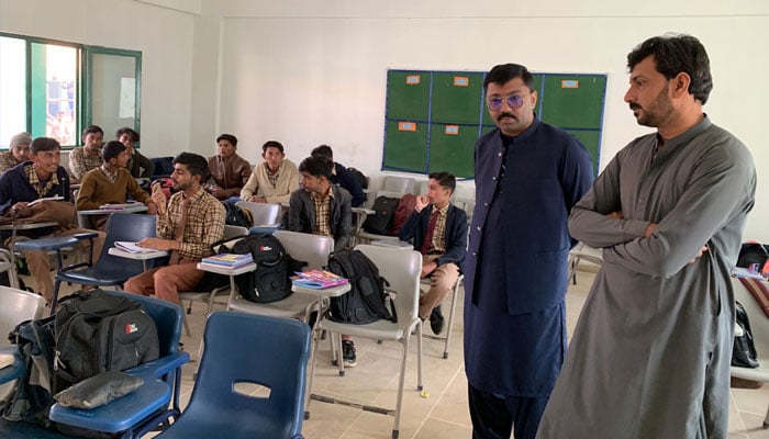 Students and teachers seen in a Sindh Education Foundation school.— Facebook@SindhEducationFoundation/File