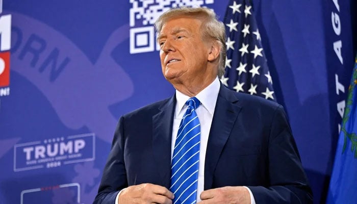 US President-elect Donald Trump stands on stage during a campaign event at Big League Dreams Las Vegas on January 27, 2024, in Las Vegas, Nevada. — AFP