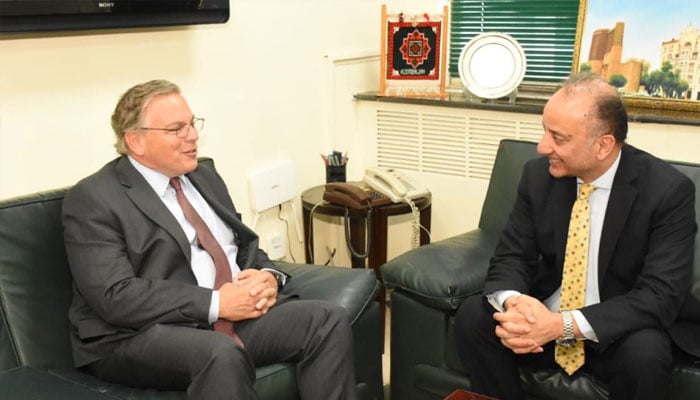 US ambassador to Pakistan Donald Blome (left) meets Federal Minister for Petroleum Dr Musadik Malik.— APP/File