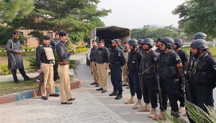 KP police officer interacts with the personnel in this image, released on November 8, 2023. — Facebook@KhyberPakhtunkhwaPolice