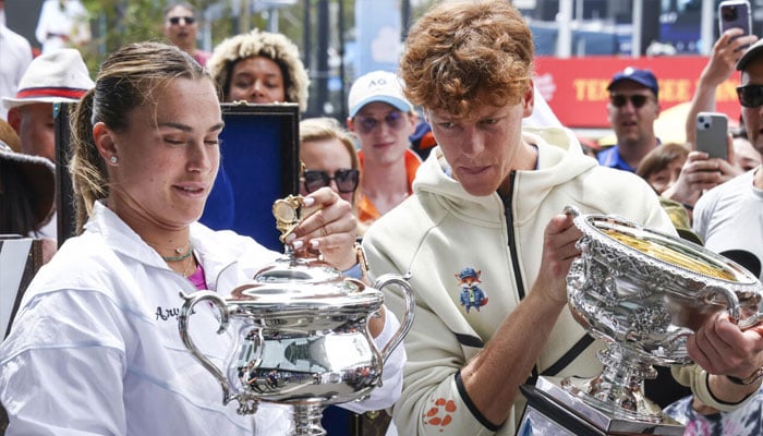 Australian Open champions Aryna Sabalenka and Jannik Sinner at the draw ceremony. —AFP/File