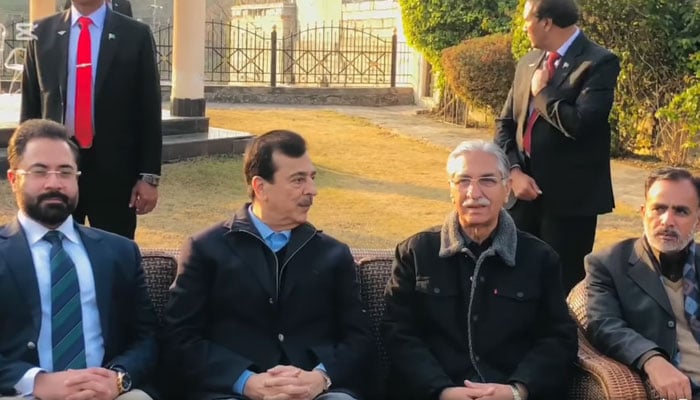 Chairman Senate Syed Yousaf Raza Gilani is seen offering condolence to Syed Nayyar Hussain Bukhari on the demise of his wife. — Facebook@Pakistansenate