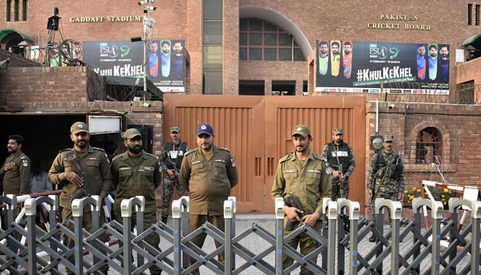 Security personnel stand guard at Gaddafi Stadium, in Lahore. — Online/File