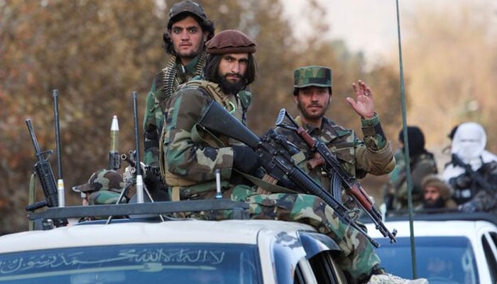 Members of Taliban sit on a military vehicle during Taliban military parade in Kabul, Afghanistan November 14, 2021. — Reuters