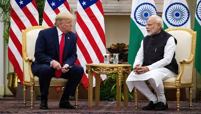 Indian Prime Minister Narendra Modi speaks to US President Donald Trump during a meeting at Hyderabad House in New Delhi, India, February 25, 2020. — Reuters