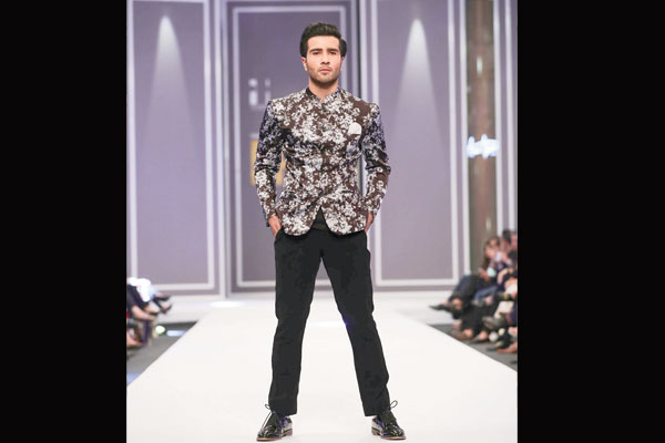 Amir Adnan showcased a sharp menswear collection, Way Forward. Actor Feroze Khan opened his show. 