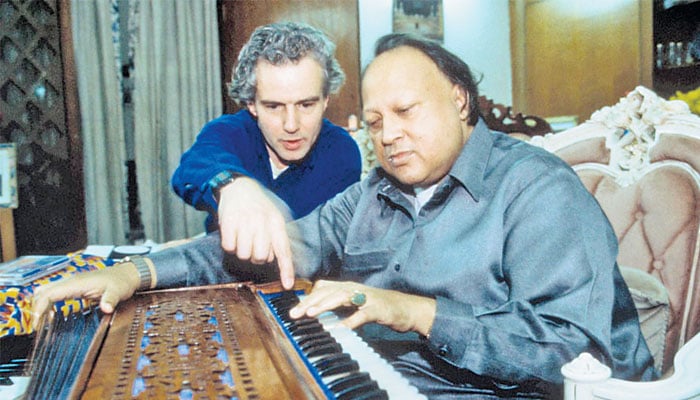 Decades ago, Michael Brook and Nusrat Fateh Ali Khan working together on what would be a record that would be remembered decades later.