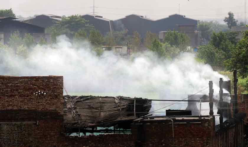 Industrial neighbourhoods such as Kot Lakhpat have an AQI reading that is five times higher than the AQI in DHA, or the area around the US Consulate. — Photos by Rahat Dar