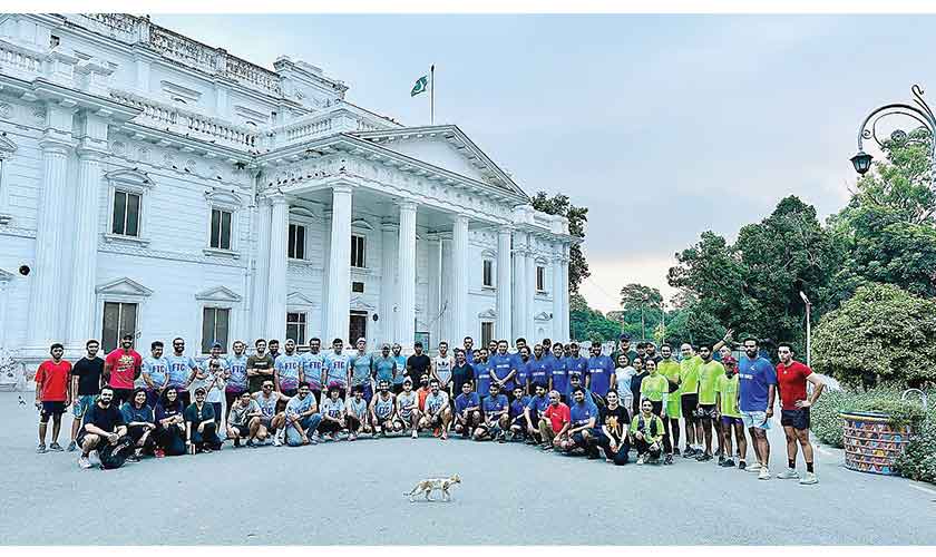 A group photo of participants and organisers of Run Lahore — Time Trial Series.