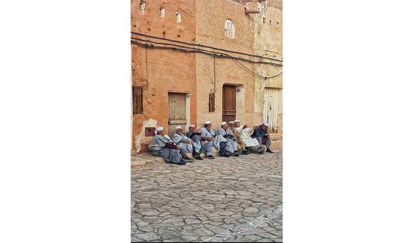 A group of men out for their afternoon chat at the town square in Ghardaia, Algeria