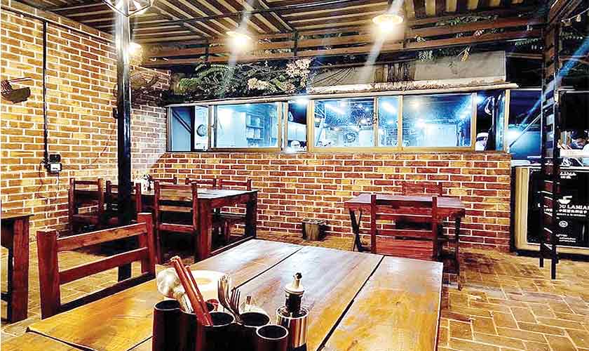 The restaurant features oak-wood furniture, giving it a rather antique vibe.