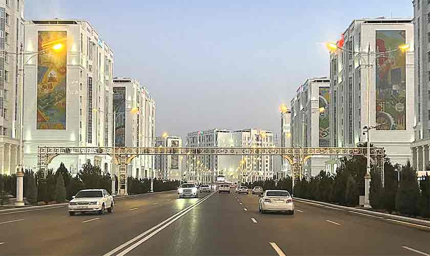 A thoroughfare lined by marble buildings in Ashgabat - also known as the White City – Photo by Shueyb Gandapur