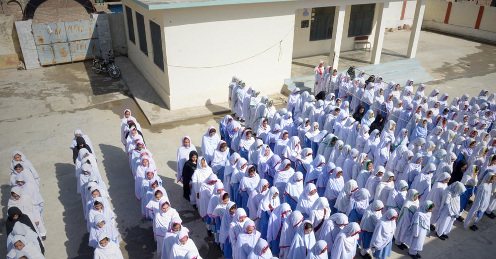 Girls attend school assembly in Mingora, the hometown of Nobel Peace Prize winner. -- Photo by A Majeed / AFP