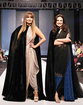 Frieha Altaf and Atiya Khan walk the ramp in a special appearance for Maheen Khan’s finale at Fashion Pakistan Week, 2014.