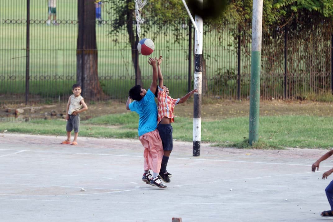 Basketball is the most popular game here. 