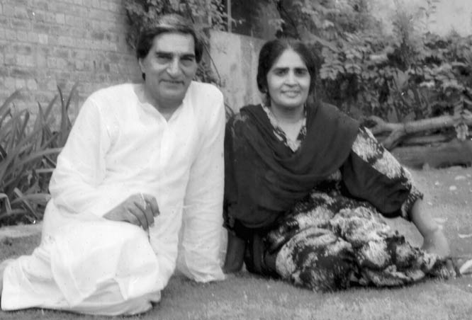 With his wife. -- Photo by Khuda Bux Abro