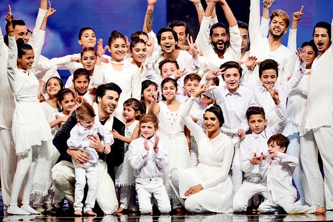 Ahsan Khan and Amna Ilyas presented a dance act on A.R. Rahman’s Gurus of Peace and were joined onstage by a group of children. Choreographed by Wahab Shah, it was quite a befitting opening to the event. 