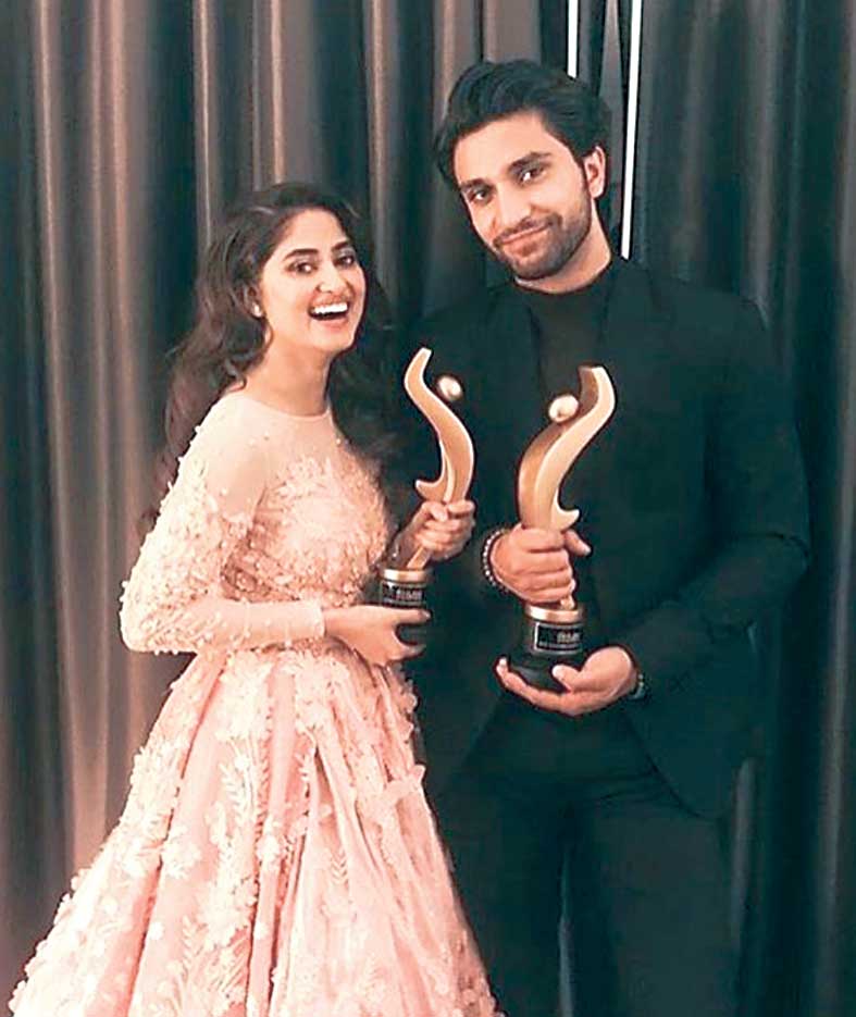 Sajal picked up three awards for Best Actor (female) - Jury for her character in Yakeen Ka Safar, Best Actor (female) - Popular also for Yakeen Ka Safar and then Best Onscreen Couple with Ahad Raza for, again - Yakeen Ka Safar. Ahad picked up just as many for Best Actor Male - Popular, Best New Sensation Television and the Best Onscreen Couple Award, all for YKS. We personally feel Sajal should have gotten the Best Actor award for O Rangreza though. They are the new sensation and we loved their off-screen chemistry too!