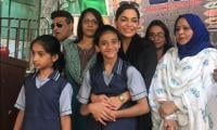 Meera donates to dam funds, spends day with special children 