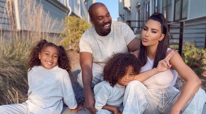 Kanye West enjoys time with son Psalm days after Kim Kardashian filed ...