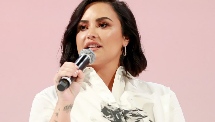 Demi Lovato says she may adopt children