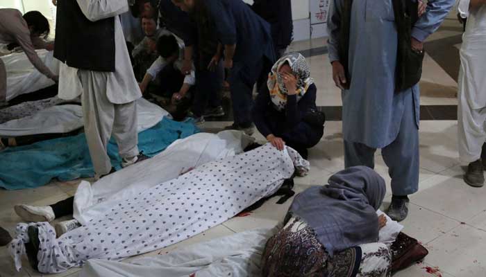More than 30 dead, dozens hurt in blast near Afghan girls' school