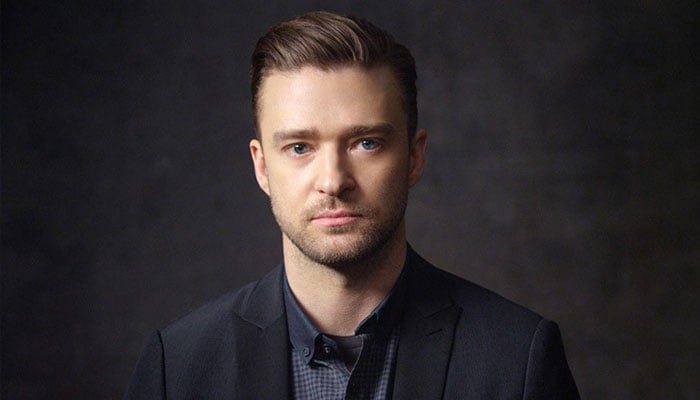 Watch: Justin Timberlake bonds with son over light sabers in Disney World