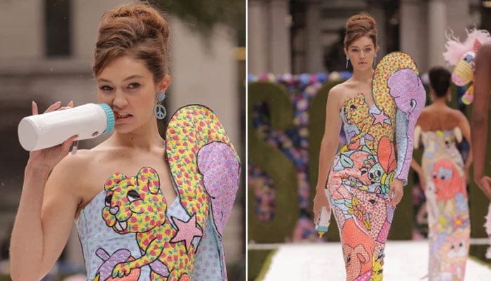 Gigi Hadid rules Moschino runway in strapless gown with baby bottle