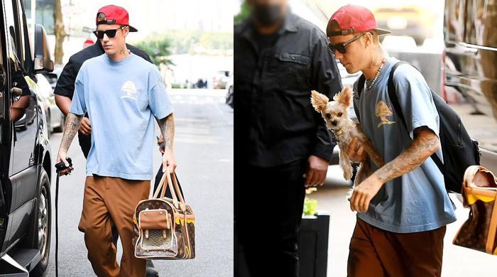 Justin Bieber looks dashing with his pup Oscar in NYC