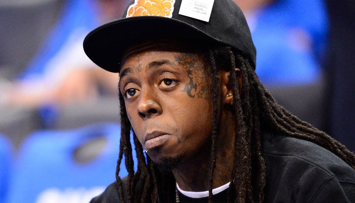 Lil Wayne under fire for ‘pulling out a gun’ on his bodyguard